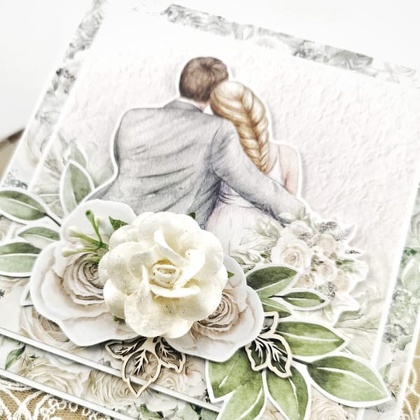 Piękny prezent ślubny. Ręcznie robiona kartka z motywem pary młodej i białą różą. Romantyczna kartka ślubna w kolorze miętowym.
